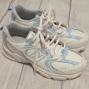 New Balance Cream and Blue Sneakers